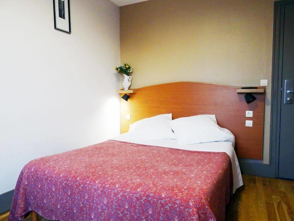 Hotel Ermitage 巴黎 外观 照片 A typical room at a hotel